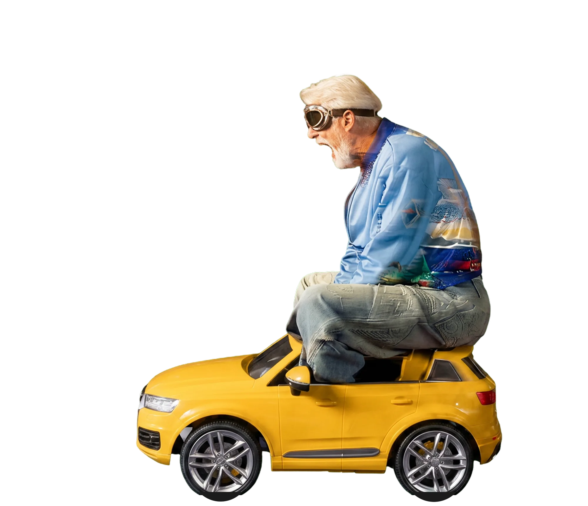 Old man in goggles riding a toy car